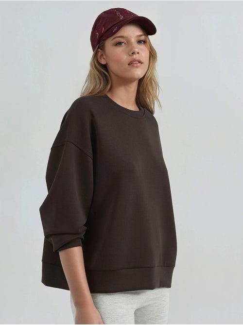 Sweat-shirt à col rond coupe décontractée busem - Kiabi Sweat-shirt à col rond coupe décontractée busem - Kiabi