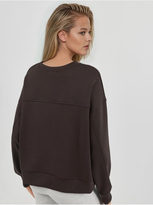 Sweat-shirt à col rond coupe décontractée busem - Kiabi Sweat-shirt à col rond coupe décontractée busem - Kiabi