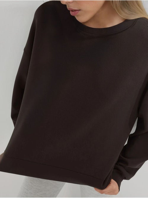 Sweat-shirt à col rond coupe décontractée busem - Kiabi Sweat-shirt à col rond coupe décontractée busem - Kiabi