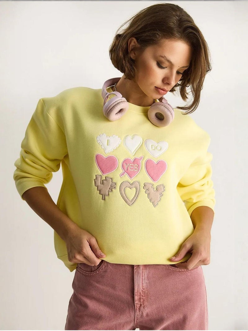 Sweat-shirt à col rond et coupe décontractée avec écusson cœur Jaune citron - Kiabi