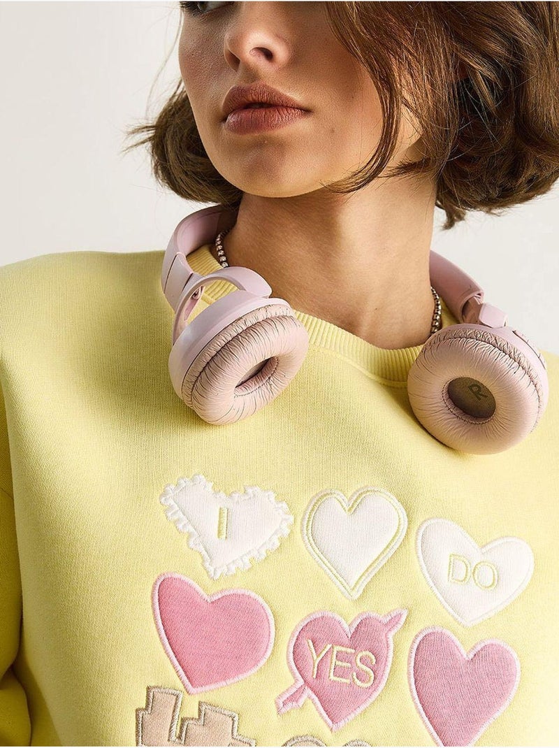 Sweat-shirt à col rond et coupe décontractée avec écusson cœur Jaune citron - Kiabi