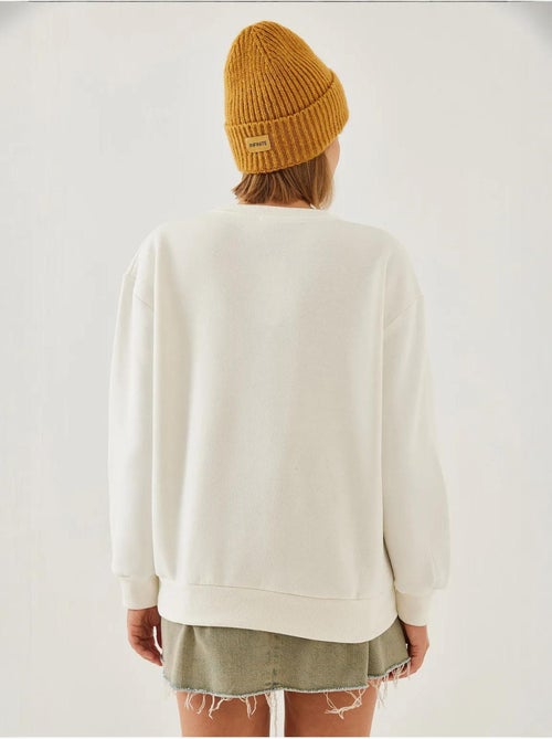 Sweat-shirt à imprimé cœur et col rond lucci - Kiabi Sweat-shirt à imprimé cœur et col rond lucci - Kiabi