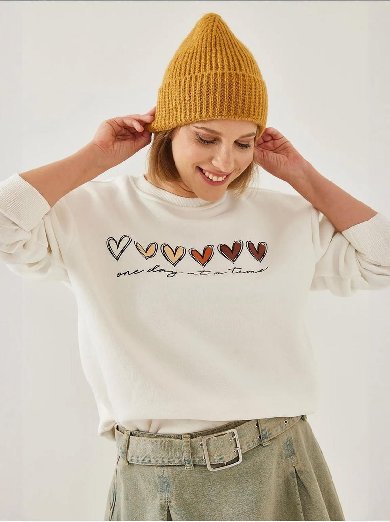 Sweat-shirt à imprimé cœur et col rond lucci Blanc - Kiabi