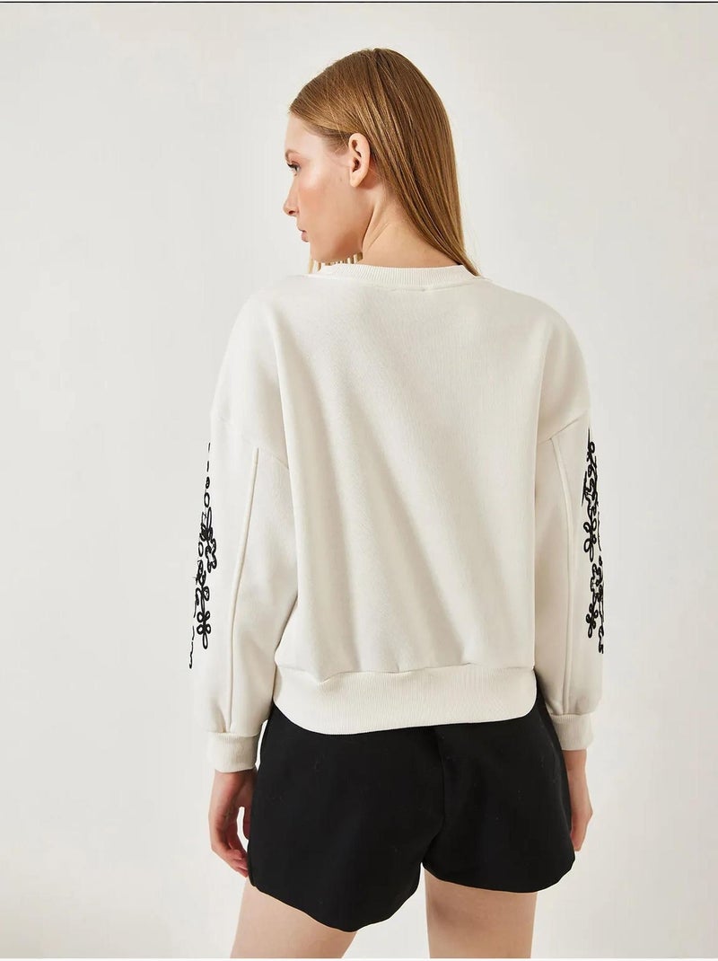 Sweat-shirt à manches brodées lucci Beige argile - Kiabi