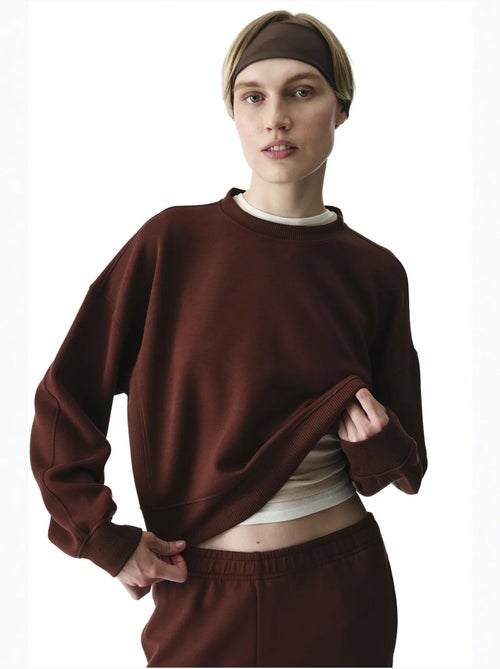 Sweat-shirt à texture soyeuse et détails contrastés, manches longues penti - Kiabi Sweat-shirt à texture soyeuse et détails contrastés, manches longues penti - Kiabi