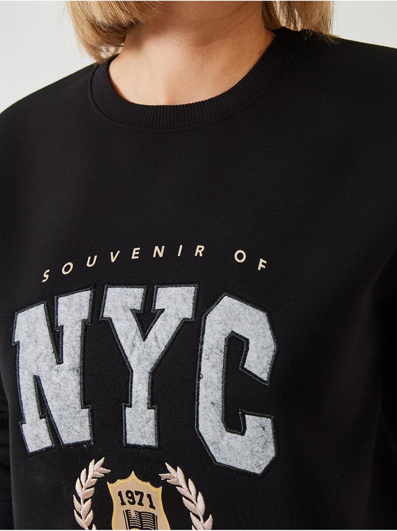 Sweat-shirt brodé à trois fils bianco lucci Noir - Kiabi