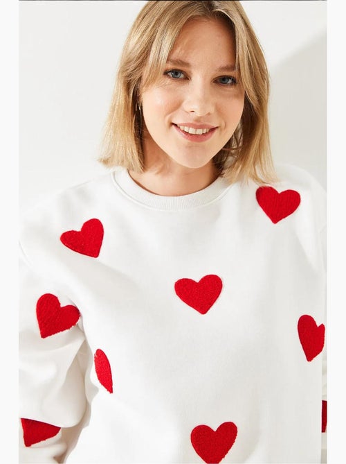 Sweat-shirt brodé cœur lucci - Kiabi Sweat-shirt brodé cœur lucci - Kiabi