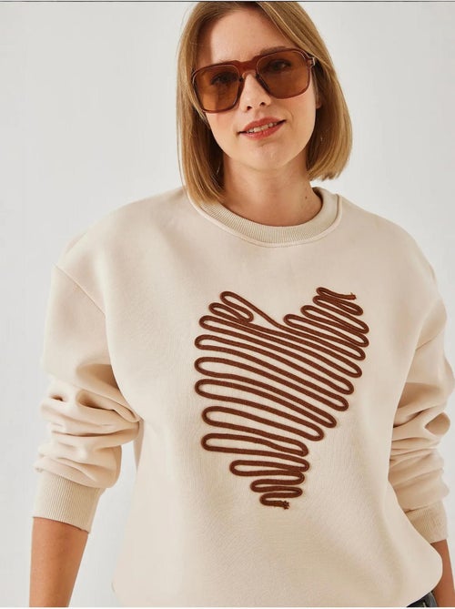 Sweat-shirt brodé cœur lucci - Kiabi Sweat-shirt brodé cœur lucci - Kiabi