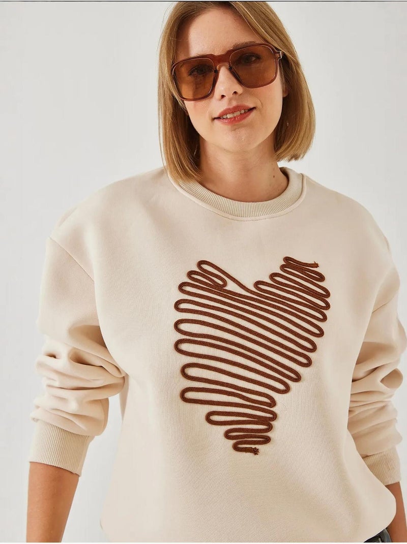 Sweat-shirt brodé cœur lucci Crème - Kiabi