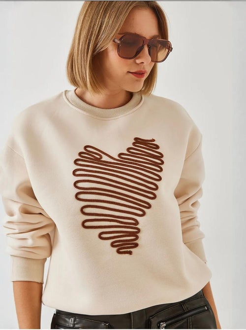 Sweat-shirt brodé cœur lucci - Kiabi Sweat-shirt brodé cœur lucci - Kiabi