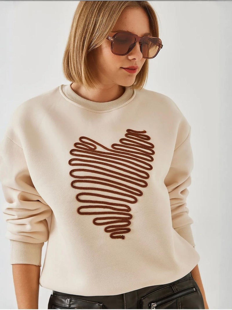Sweat-shirt brodé cœur lucci Crème - Kiabi