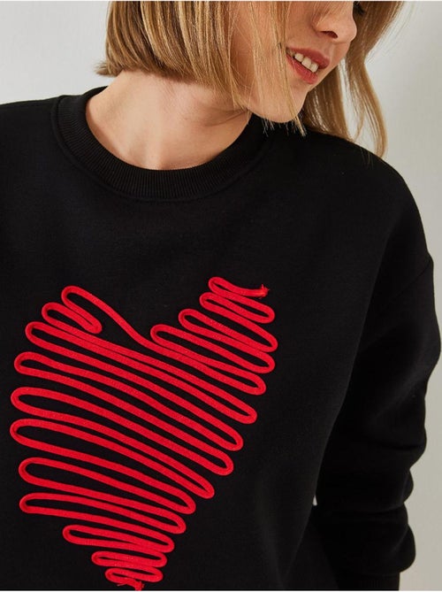 Sweat-shirt brodé cœur lucci - Kiabi Sweat-shirt brodé cœur lucci - Kiabi