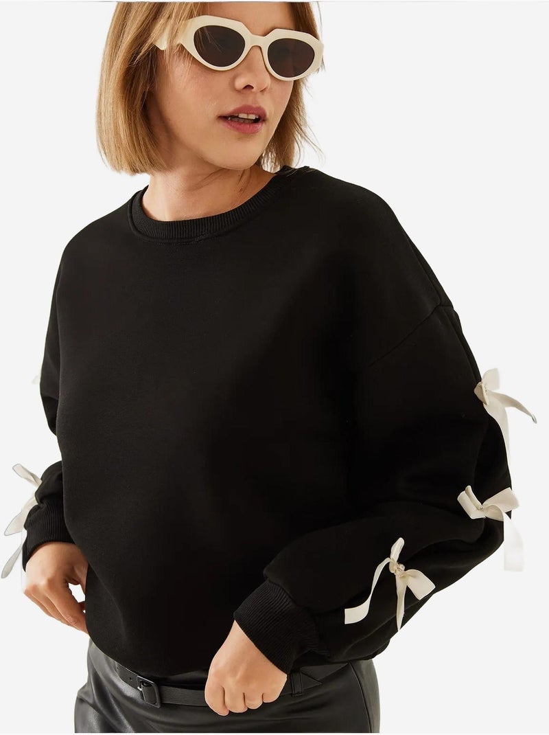 Sweat-shirt brossé trois fils bianco lucci avec manches à nœud Noir - Kiabi
