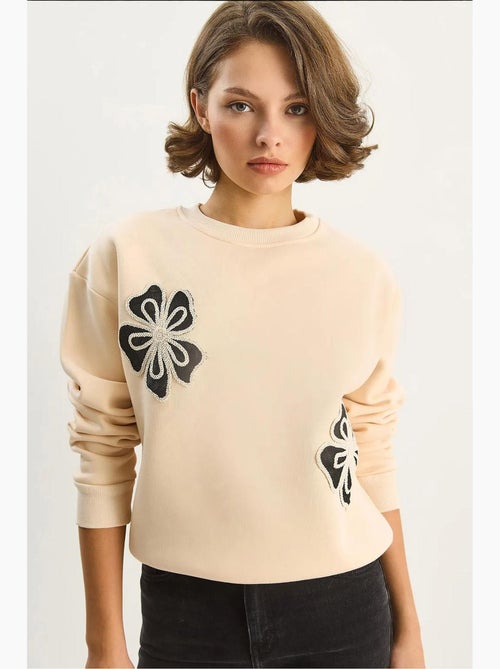 Sweat-shirt en coton à col rond brodé lucci - Kiabi Sweat-shirt en coton à col rond brodé lucci - Kiabi