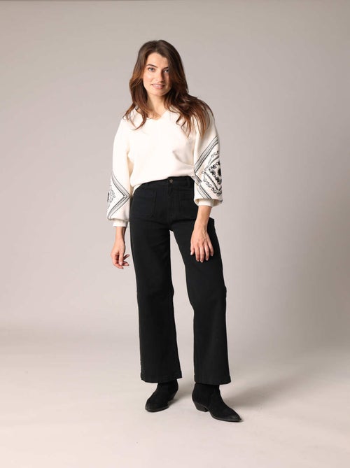 Sweat-shirt en polaire douce à manches longues ballon décorées de motifs brodés
 'Deeluxe' - Kiabi