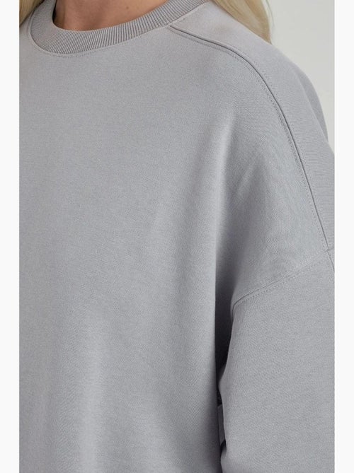 Sweat-shirt en tricot à col rond et coupe décontractée hiccup - Kiabi Sweat-shirt en tricot à col rond et coupe décontractée hiccup - Kiabi