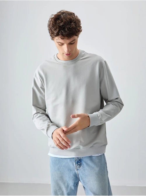 Sweat-shirt homme col rond uni tommy - Kiabi Sweat-shirt homme col rond uni tommy - Kiabi