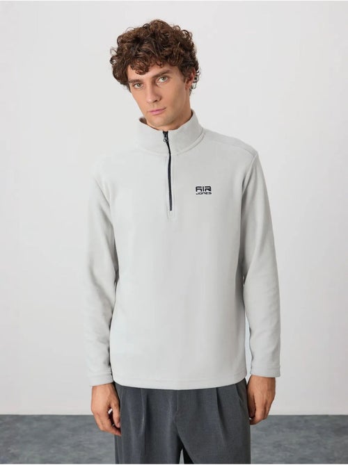 Sweat-shirt homme en maille peluche, demi-zip tommy - Kiabi Sweat-shirt homme en maille peluche, demi-zip tommy - Kiabi