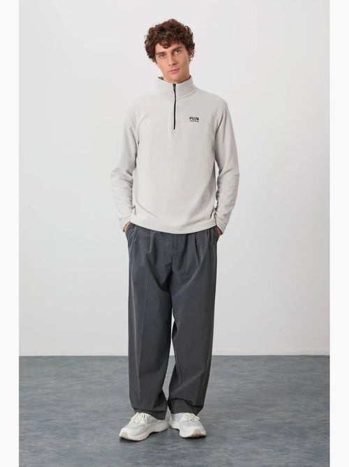 Sweat-shirt homme en maille peluche, demi-zip tommy - Kiabi Sweat-shirt homme en maille peluche, demi-zip tommy - Kiabi