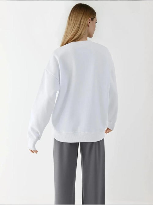 Sweat-shirt imprimé à col rond - Kiabi Sweat-shirt imprimé à col rond - Kiabi