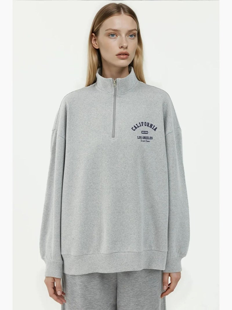 Sweat-shirt imprimé à col zippé et coupe décontractée hiccup Gris clair - Kiabi