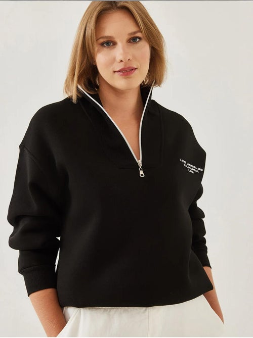 Sweat-shirt oversize brossé à col montant et fermeture éclair lucci - Kiabi Sweat-shirt oversize brossé à col montant et fermeture éclair lucci - Kiabi