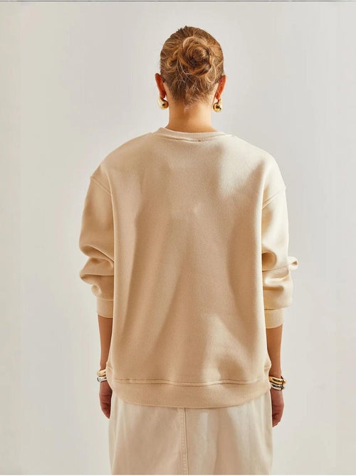 Sweat-shirt oversize imprimé brossé trois plis bianco lucci - Kiabi Sweat-shirt oversize imprimé brossé trois plis bianco lucci - Kiabi