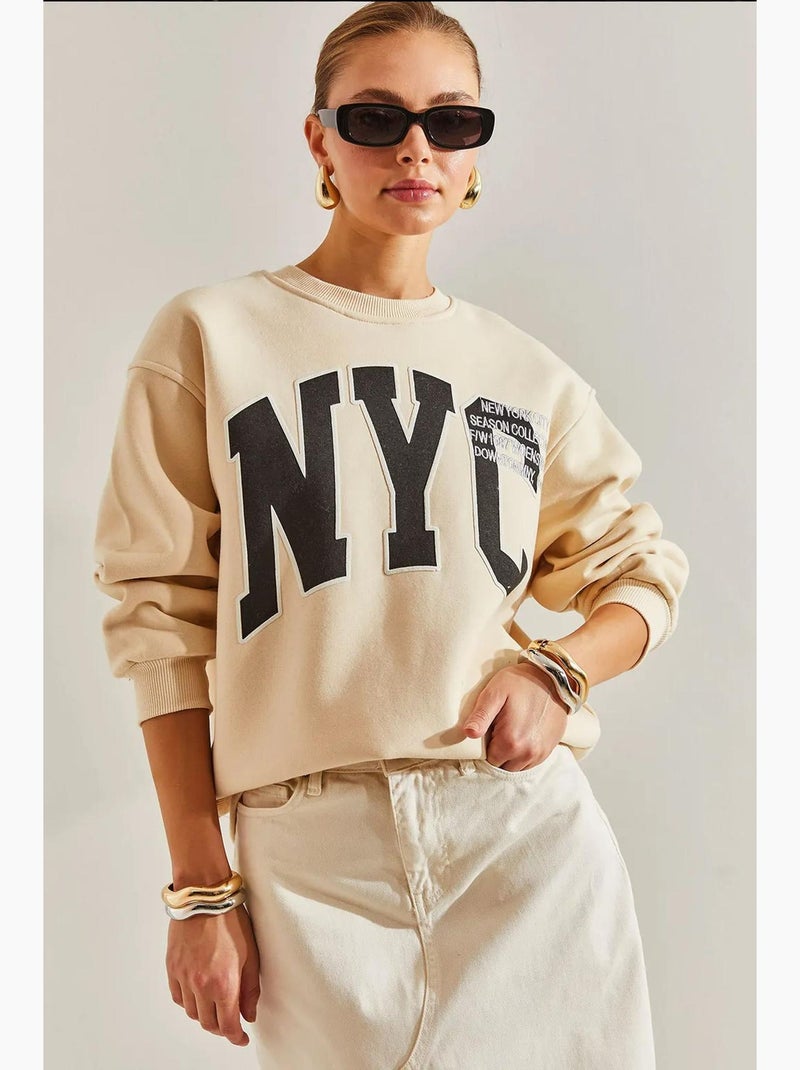 Sweat-shirt oversize imprimé brossé trois plis lucci Beige argile - Kiabi