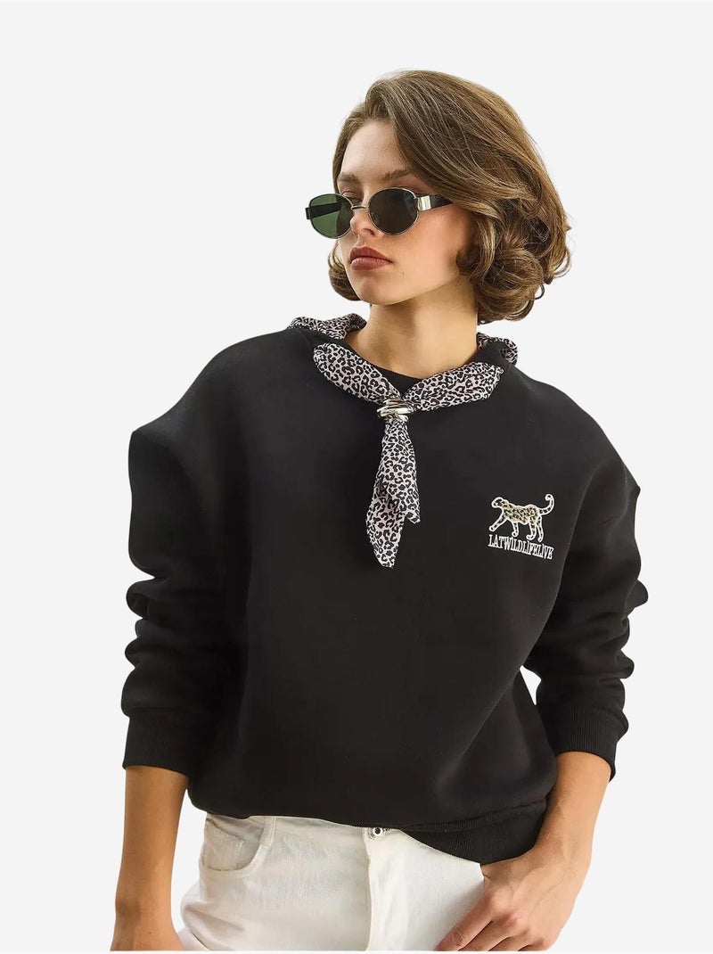 Sweat-shirt ras du cou brodé à imprimé léopard lucci Noir - Kiabi