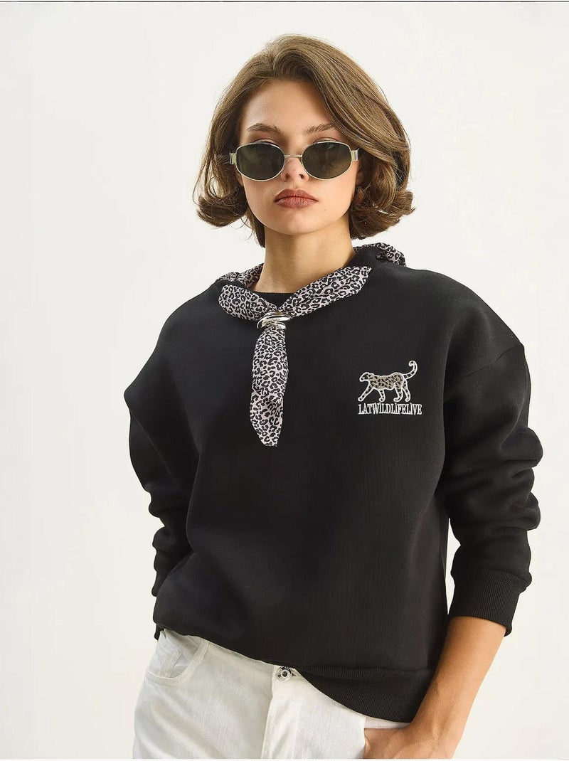 Sweat-shirt ras du cou brodé à imprimé léopard lucci Noir - Kiabi
