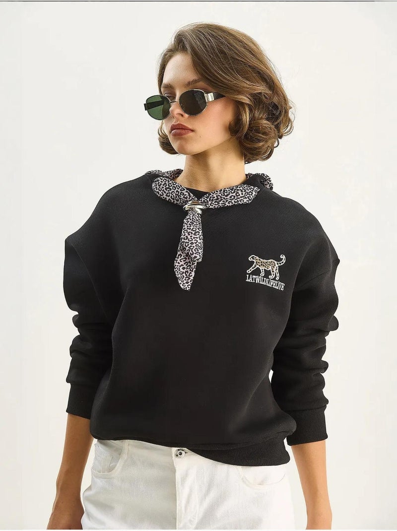 Sweat-shirt ras du cou brodé à imprimé léopard lucci Noir - Kiabi