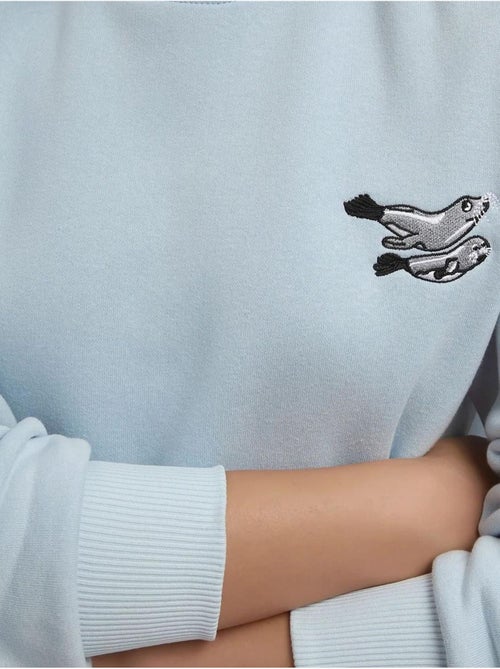 Sweat-shirt ras du cou brodé à motif animalier confortable hiccup - Kiabi Sweat-shirt ras du cou brodé à motif animalier confortable hiccup - Kiabi