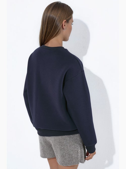 Sweat-shirt ras du cou brodé hiccup - Kiabi Sweat-shirt ras du cou brodé hiccup - Kiabi