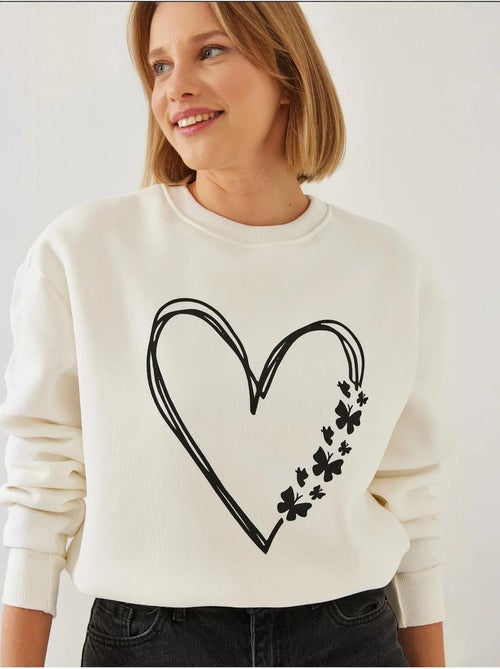 Sweat-shirt ras du cou en fil brossé imprimé cœur lucci - Kiabi Sweat-shirt ras du cou en fil brossé imprimé cœur lucci - Kiabi