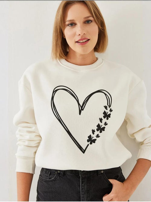 Sweat-shirt ras du cou en fil brossé imprimé cœur lucci - Kiabi Sweat-shirt ras du cou en fil brossé imprimé cœur lucci - Kiabi
