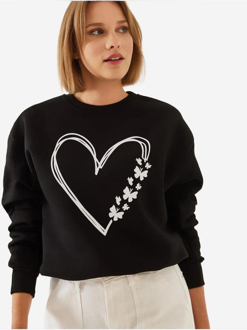 Sweat-shirt ras du cou en fil brossé imprimé cœur lucci - Kiabi Sweat-shirt ras du cou en fil brossé imprimé cœur lucci - Kiabi