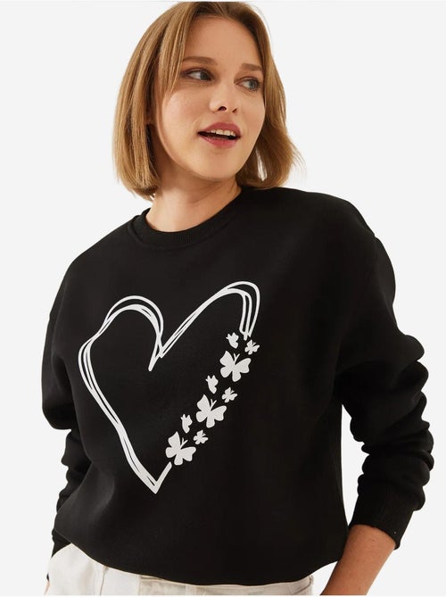 Sweat-shirt ras du cou en fil brossé imprimé cœur lucci - Kiabi Sweat-shirt ras du cou en fil brossé imprimé cœur lucci - Kiabi