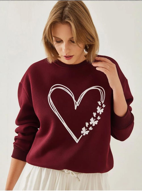 Sweat-shirt ras du cou en fil brossé imprimé cœur lucci - Kiabi Sweat-shirt ras du cou en fil brossé imprimé cœur lucci - Kiabi