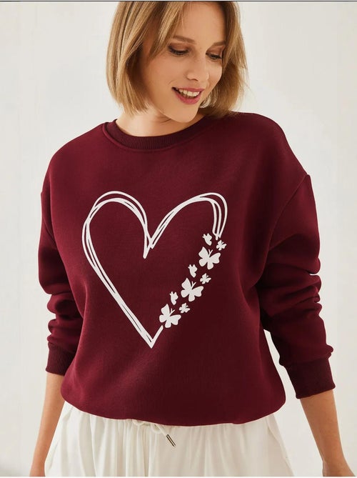 Sweat-shirt ras du cou en fil brossé imprimé cœur lucci - Kiabi Sweat-shirt ras du cou en fil brossé imprimé cœur lucci - Kiabi