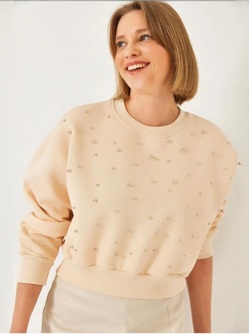 Sweat-shirt ras du cou lucci en tissu brossé triple fil orné de perles - Kiabi Sweat-shirt ras du cou lucci en tissu brossé triple fil orné de perles - Kiabi