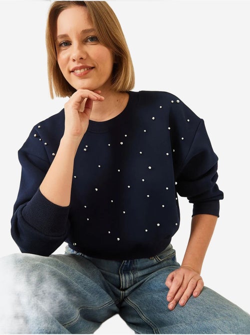 Sweat-shirt ras du cou lucci en tissu brossé triple fil orné de perles - Kiabi Sweat-shirt ras du cou lucci en tissu brossé triple fil orné de perles - Kiabi