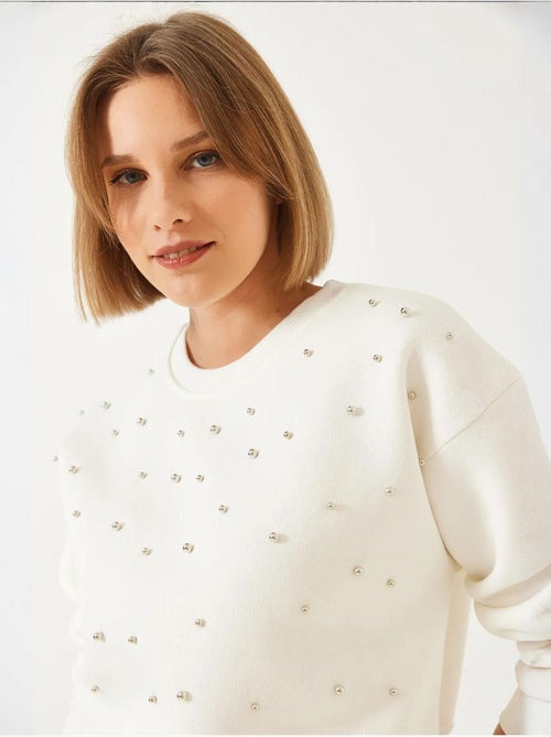 Sweat-shirt ras du cou lucci en tissu brossé triple fil orné de perles - Kiabi Sweat-shirt ras du cou lucci en tissu brossé triple fil orné de perles - Kiabi