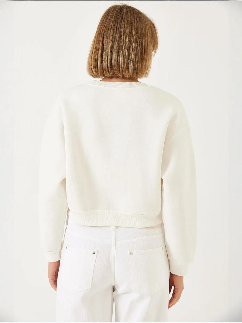 Sweat-shirt ras du cou lucci en tissu brossé triple fil orné de perles Crème - Kiabi