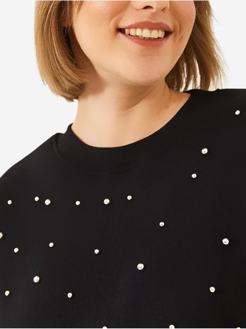 Sweat-shirt ras du cou lucci en tissu brossé triple fil orné de perles - Kiabi Sweat-shirt ras du cou lucci en tissu brossé triple fil orné de perles - Kiabi