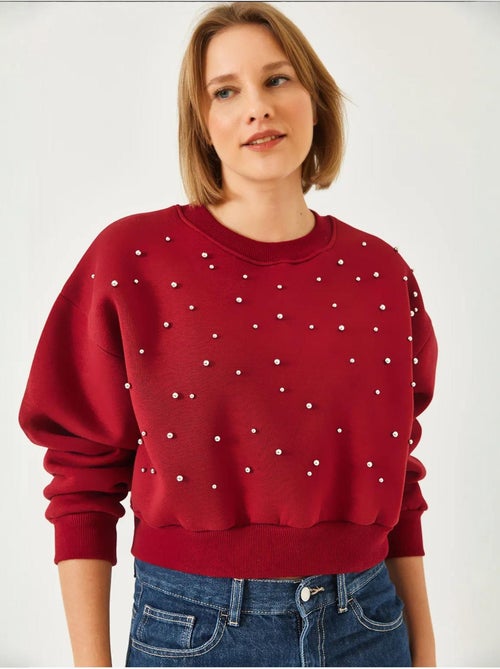 Sweat-shirt ras du cou lucci en tissu brossé triple fil orné de perles - Kiabi Sweat-shirt ras du cou lucci en tissu brossé triple fil orné de perles - Kiabi