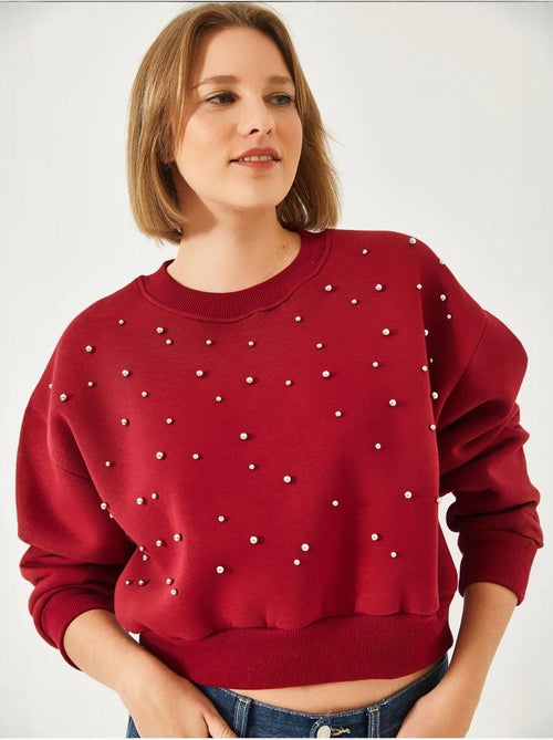 Sweat-shirt ras du cou lucci en tissu brossé triple fil orné de perles - Kiabi Sweat-shirt ras du cou lucci en tissu brossé triple fil orné de perles - Kiabi