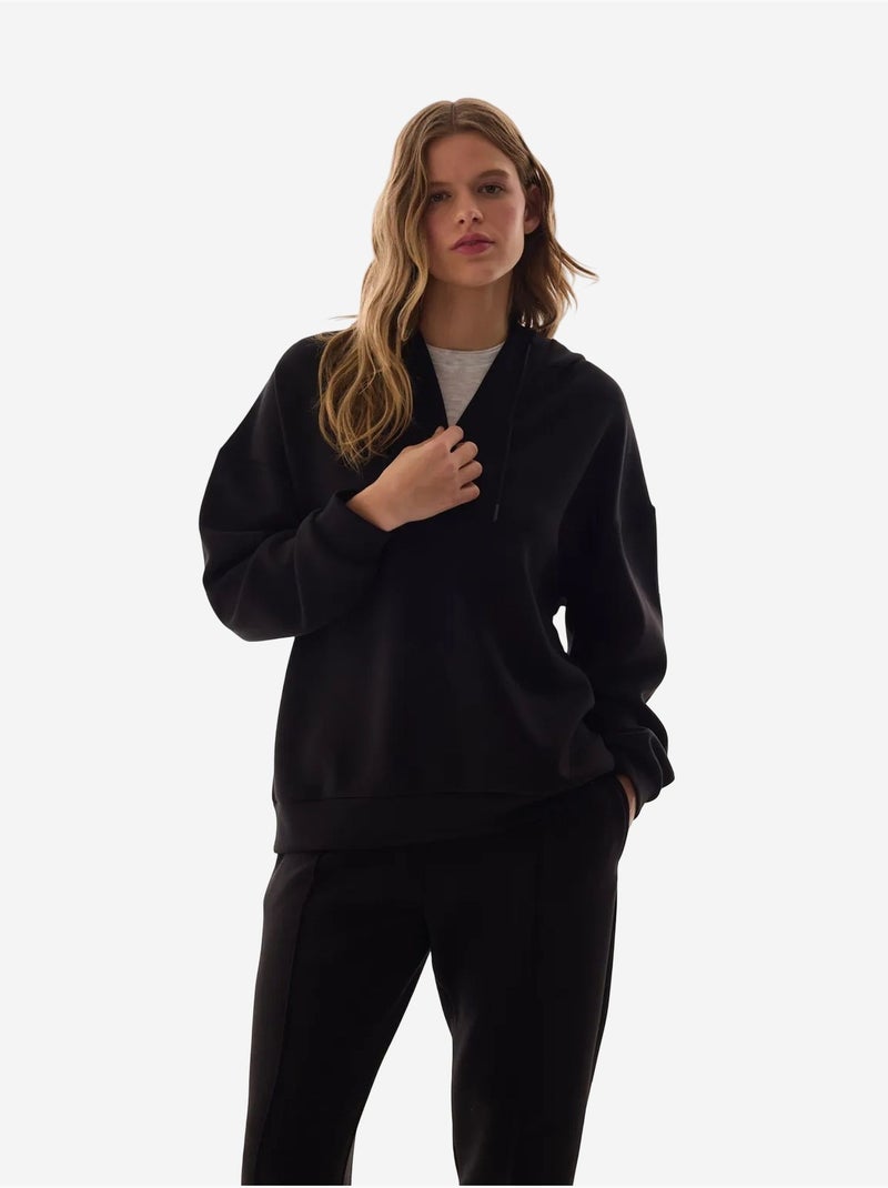 Sweat-shirt texturé soyeux à col v et manches longues penti Noir - Kiabi