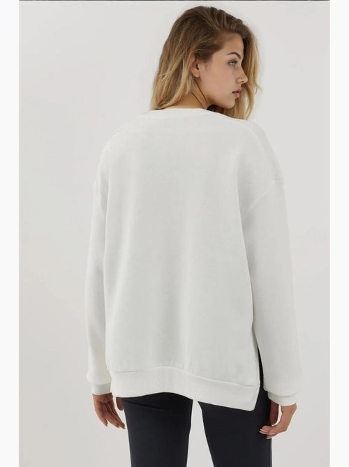 Sweat-shirt tricoté texturé à col ras du cou avec fermeture éclair hiccup - Kiabi Sweat-shirt tricoté texturé à col ras du cou avec fermeture éclair hiccup - Kiabi