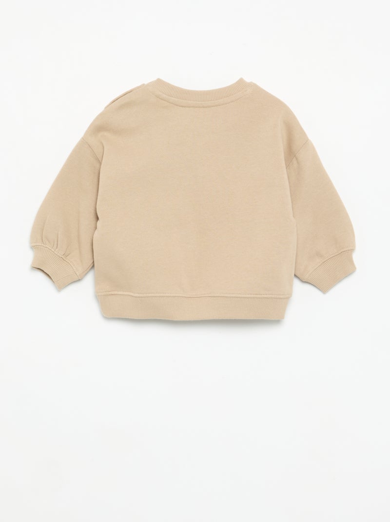 Sweat uni avec imprimé poitrine Beige - Kiabi