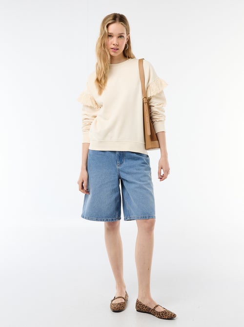 Sweat uni avec volants en borderies anglaises sur les manches - Kiabi